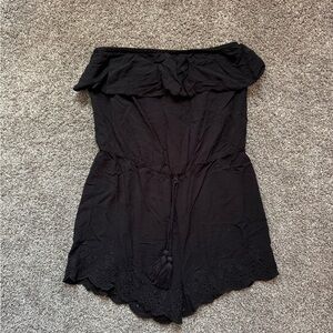 Black strapless romper in a medium